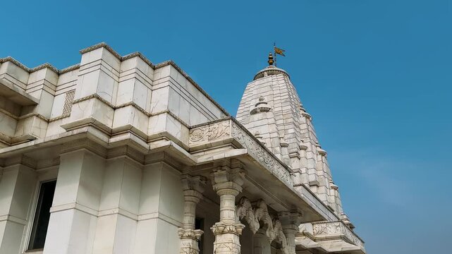 Birla Mandir Temple, Jaipur, India. Majestic Structure of a Temple Beneath a Clear Blue Sky, Showcasing Intricate Architecture and Spiritual Significance in Every Detail of Its Design