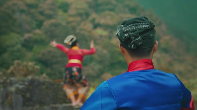 Javanese Dancer with Outstretched Arms Performing in Nature