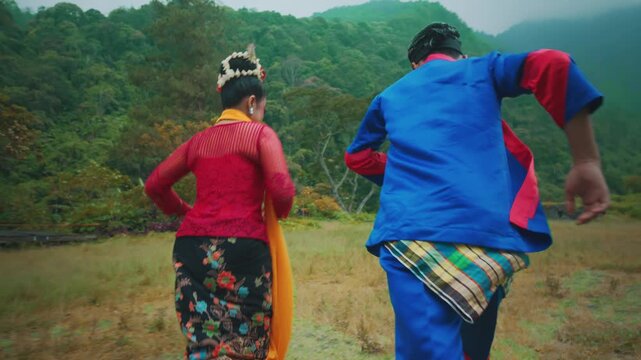 Rear View of Couple Walking Away with Piggyback Ride