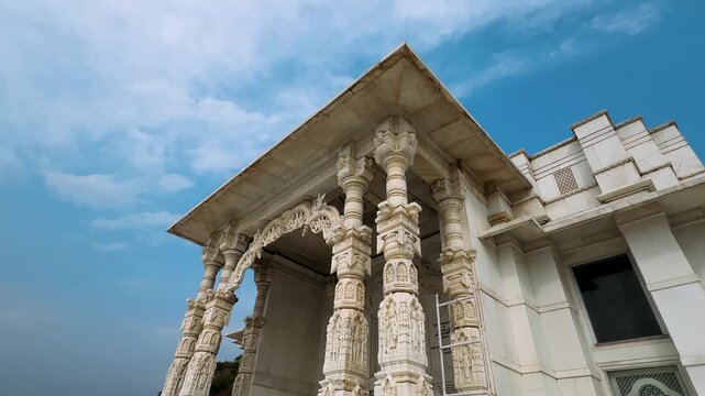 Birla Mandir Temple, Jaipur, India. Intricate Architectural Details of a Stunning Religious Structure Beneath a Beautiful Sky Showcasing Artistry and Craftsmanship in Stone Carving.