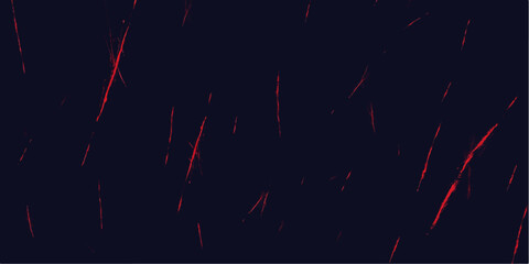 A bright red firework explosion creates a magic abstract light display of motion and sparks against the black night sky, perfect for a Christmas celebration © Alpha Designs