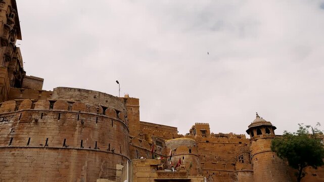 Jaisalmer, India. A Majestic View of a Historic Fort Surrounded by a Dramatic Sky, Showcasing Ancient Architecture and the Natural Beauty of the Surroundings in a Captivating Frame