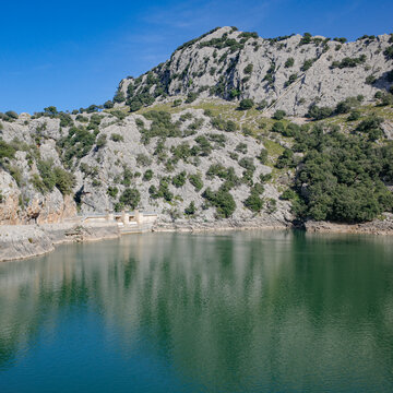Mallorca, Spain - 15 Feb 2025: Reservoir Gorg Blau in Mallorca's Tramuntana mountains, Spain