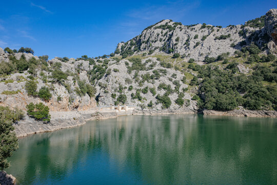 Mallorca, Spain - 15 Feb 2025: Reservoir Gorg Blau in Mallorca's Tramuntana mountains, Spain