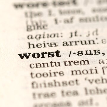 Close up of dictionary page highlighting the word worst