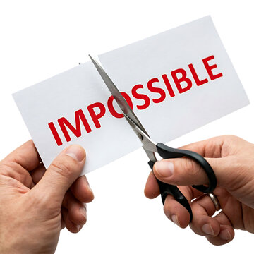 A high quality Hands Cutting the Word Impossible with Scissors  Isolated on White Background.