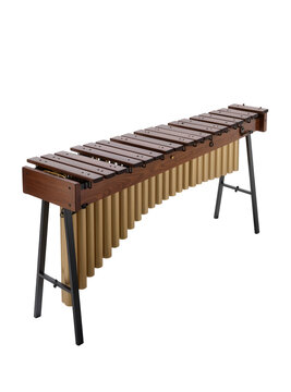Isolated professional marimba percussion instrument featuring wooden bars and brass resonators