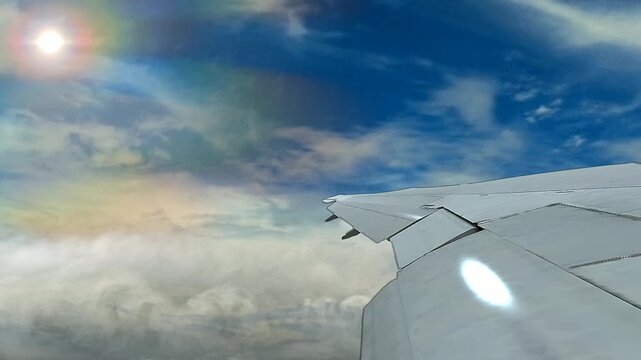 Capturing the breathtaking beauty of a plane wing slicing through a cloudy sky with the sun creating a beautiful rainbow effect in the distance