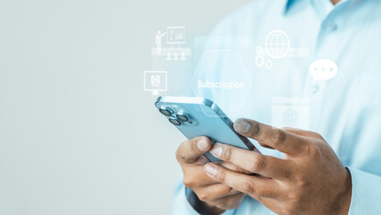 Obraz premium Person using smartphone with subscription interface, showing recurring billing, plan management, monthly expense, premium service, and digital payment concept.