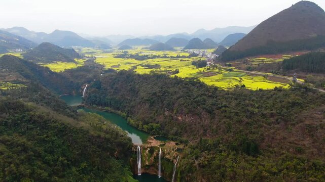 Karst Mountains and Rapeseed Fields in Luoping, China in Luoping, Yunnan, China
