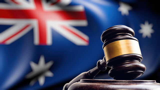 Australian legal system conceptual gavel with national flag background