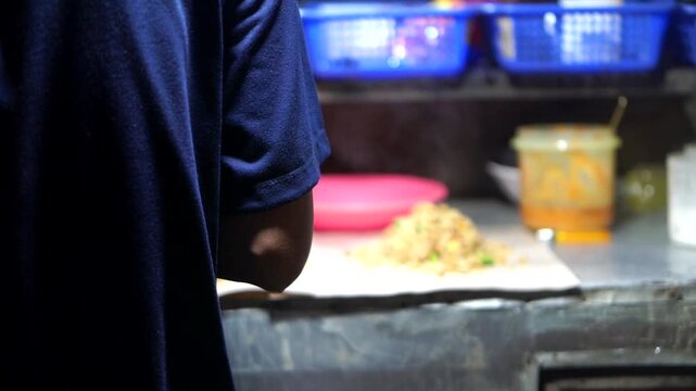 Freshly cooked fried rice portion with hot aroma and appetizing appearance.	
