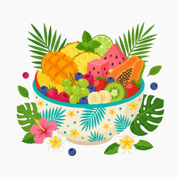 Tropical fruit salad in a decorative bowl with palm leaves and flowers