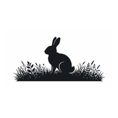 Obraz premium Black silhouette of a rabbit sitting in grass rabbit silhouette meadow animal d