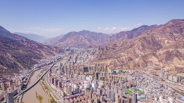 Aerial view of Lanzhou city in mountain valley along the Yellow River in Lanzhou, China
