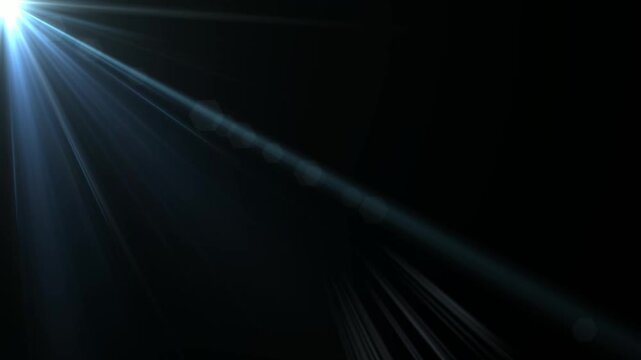 Optical flare with light rays on black background alpha chenel. shine light lens flares flickering animation overlays. white light star burst, abstract glow lens flare background.4 k animation video.
