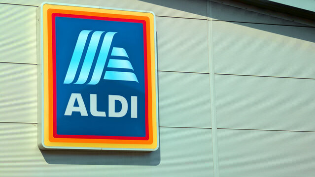 Leicester, England, UK - 8 April 2026: Aldi supermarket store sign on cladding wall, close up of famous discount grocery retailer logo outside corporate shop facade in the United Kingdom