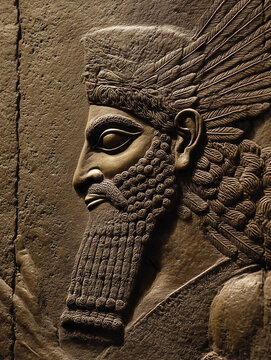 Ancient Sumerian god king relief sculpture of bearded figure
