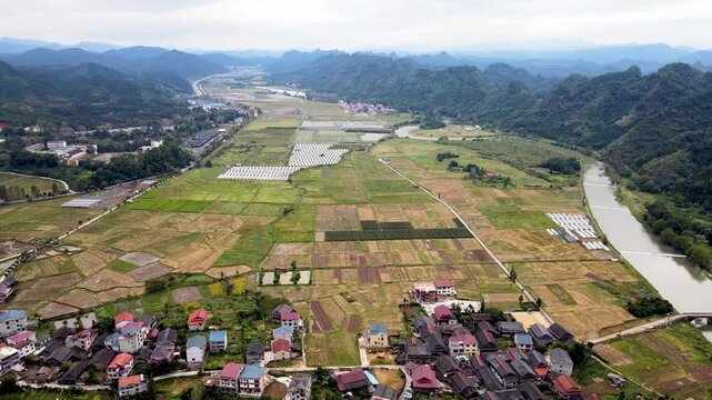 Aerial View of Rural Village Farmland and River Valley