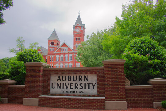 Historic William J. Samford Hall Clock Tower on Auburn University Campus With Red Brick Facade and Lawn. Editorial Use Only Auburn, AL USA May 12, 2026. Overlooking a manicured campus lawn, conveying 