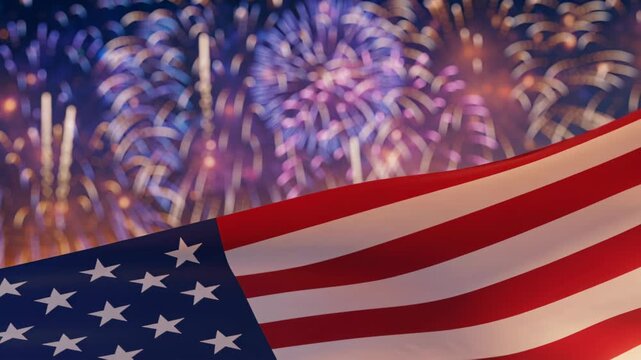 Fireworks explode in the night sky while the American flag waves. This happens during a summer celebration with bright colors and loud sounds
