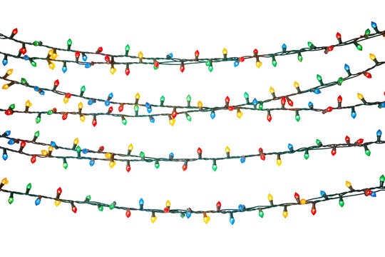 Isolated vibrant Christmas string lights glowing with multiple colorful bulbs decoration.
