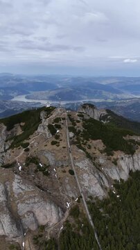Toaca Peak staircase aerial view with Bicaz Lake valley Romania