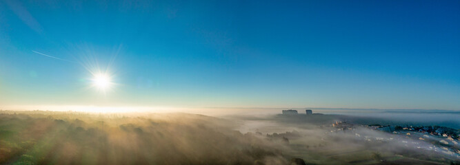 Fototapeta premium Panoramic Sunrise Over Baden Wurttemberg, Germany With Light Fog
