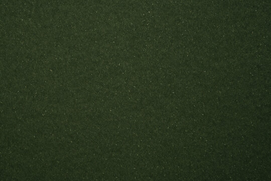 Dark green recycled paper texture background surface