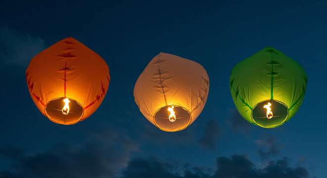 Three colorful sky lanterns