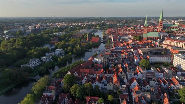 Lubeck city Aerial shot. Saint Marie and saint peter churches, Holstentor Gothic gate, Schleswig-Holstein land, Germany