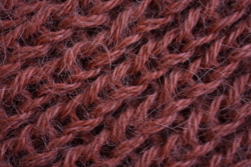 Fototapeta premium Pink knitted fabric texture background, chunky knit wool pattern closeup, cozy textile surface
