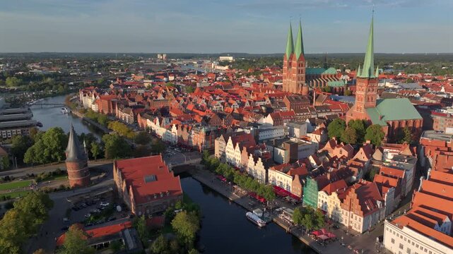 Lubeck city Aerial shot. Saint Marie and saint peter churches, Holstentor Gothic gate, Schleswig-Holstein land, Germany