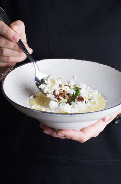 Corn porridge with cheese and cracklings. Banosh with cheese.