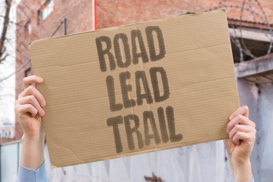 "Road Lead Trail" Crumbling roads lead-tainted water and permit-locked trails each mark a different public loss. ROADS. LEAD. TAINTED. TRAILS. LOSS.