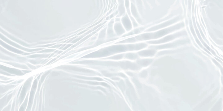 Clear water surface with sun light reflections and soft ripple waves in a bright pool