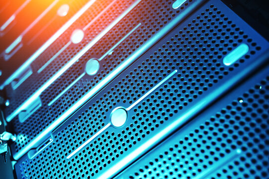 Futuristic glowing server front panel Abstract technology background representing cybersecurity web hosting and network infrastructure.