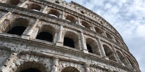 Naklejka premium Photo of Roman colosseum with ancient architectural design 