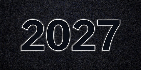 Fototapeta premium 2027 new year text, calendar 2027, matte black number 2027, asphalt texture background, future banner, typography, minimalist card, creative font, countdown graphics, modern design, sleek background.
