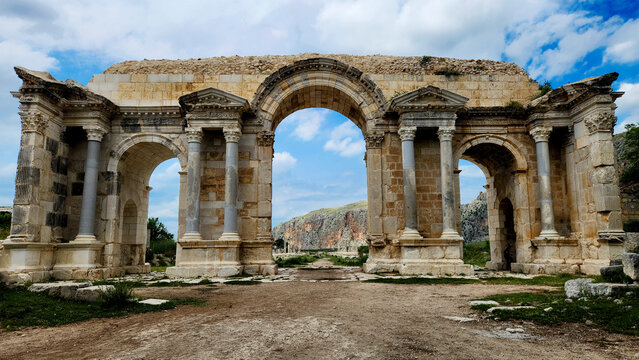 The unique three-arched Victory Gate to the ancient Anavarza city in Dilekkaya village of Kozan district in Adana province (Turkey). Once marked the entrance to one of largest Roman cities in the anci