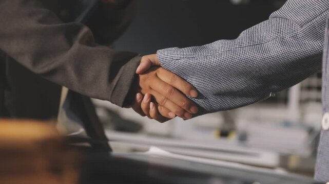 Agreement, meeting and business people with handshake in office, accounting firm and success for b2b deal. Boardroom, teamwork and accountants with shaking hands for welcome, greeting and thank you