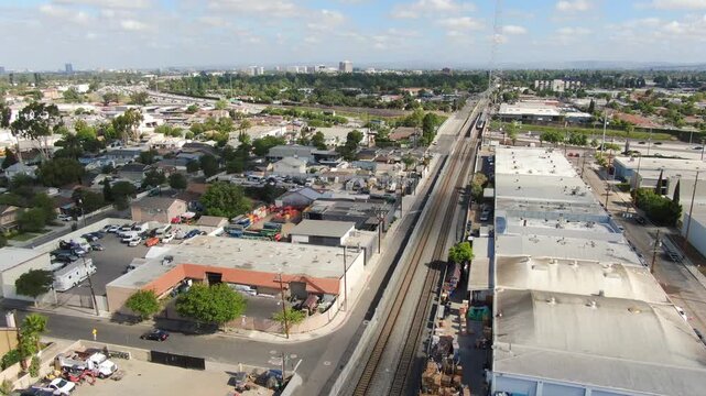 Aerial View of Rail Corridor and Downtown Santa Ana Skyline Reveal