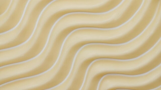 Yellow skincare cosmetic cream texture footage. Moisturising waves cream texture motion with spatula. Body care light creamy beauty product smudge closeup. Sample for advertising cosmetic products. 4k