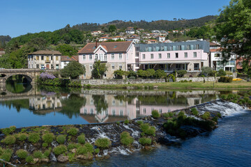 Fototapeta premium Arcos de valdevez village beside vez river reflecting architecture