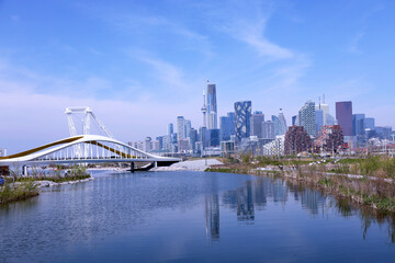 Fototapeta premium Biidaasige Park and the lower Don River with downtown Toronto skyline in the background