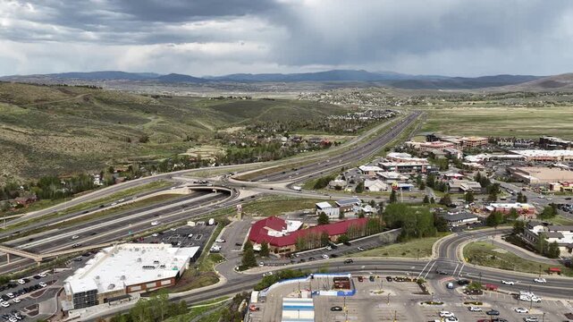 Aerial of Kimball Junction Utah along Interstate 80 in spring time near Park City