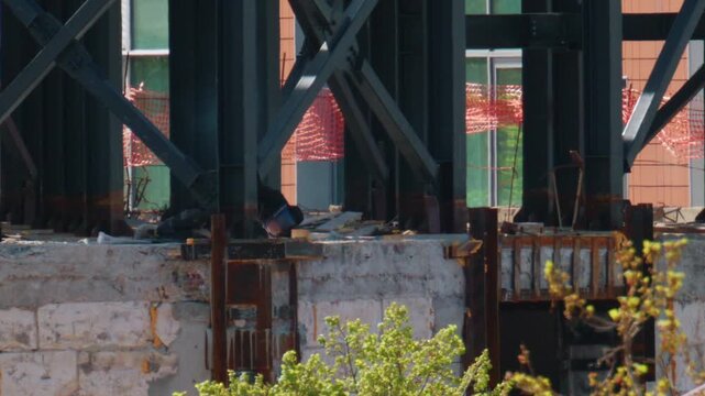 Close up view of steel beams and structural supports on an active construction site
