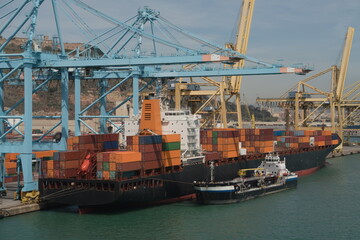Fototapeta premium Container ship at APM Terminals in Port of Barcelona, Spain