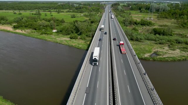 Aerial view of S8 expressway bridge over the Bug river in Wyszkow, Poland, 4k video
