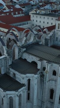 Cinematic Aerial View of Ancient Gothic Church in Lisbon Portugal at Golden Hour
